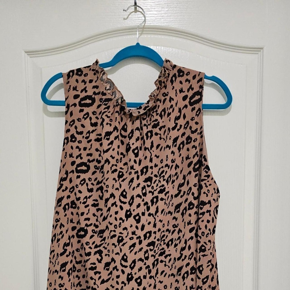 Tan leopard print lined blouse with ruffle neckline